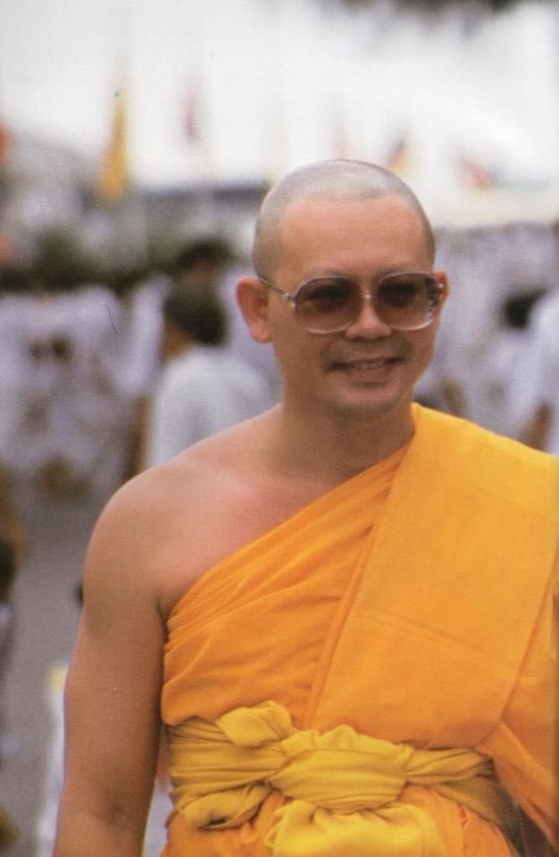 Luang Por Dhammajayo smiling warmly during a public appearance